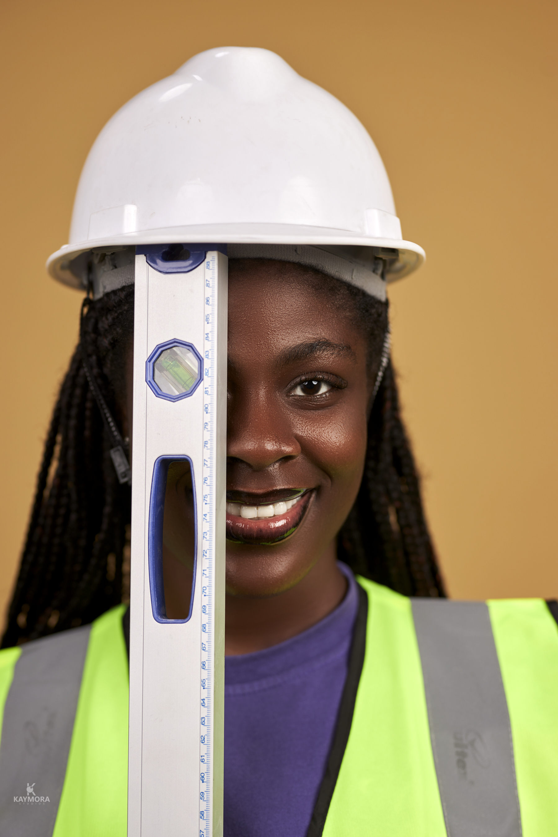 Consultants and clients discussing an interior plan in Accra