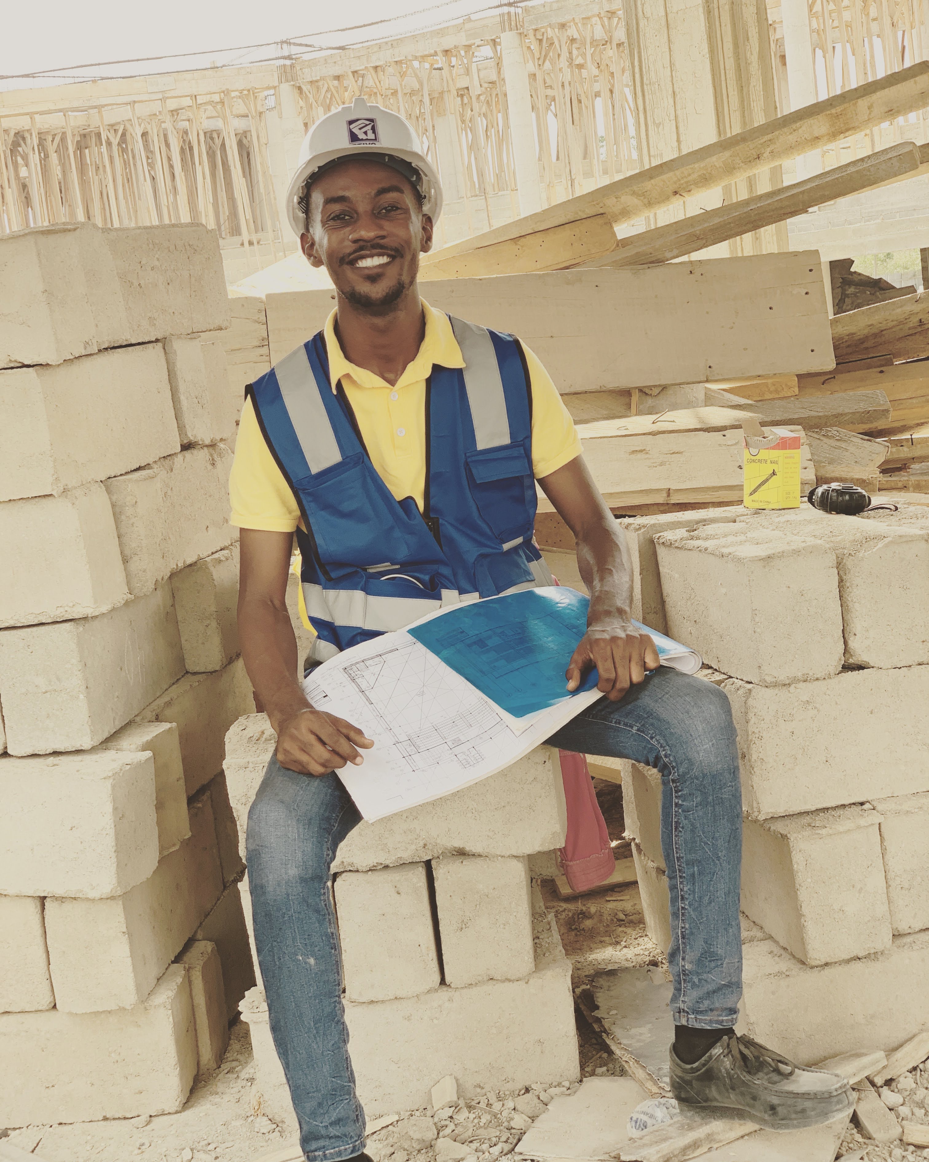 Facade scaffolding with safety netting and inspection team