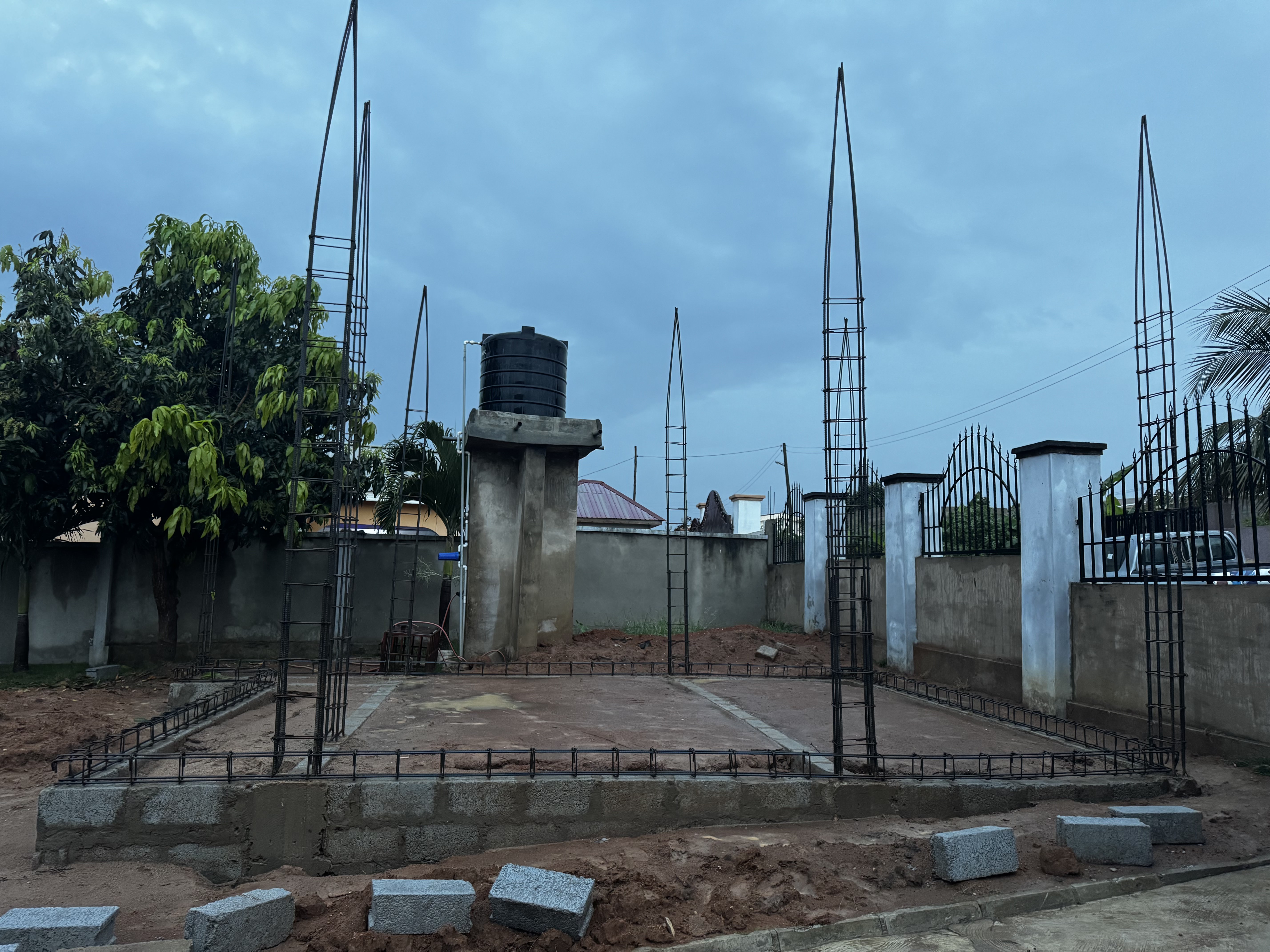 Night concrete pour illuminated by temporary lighting